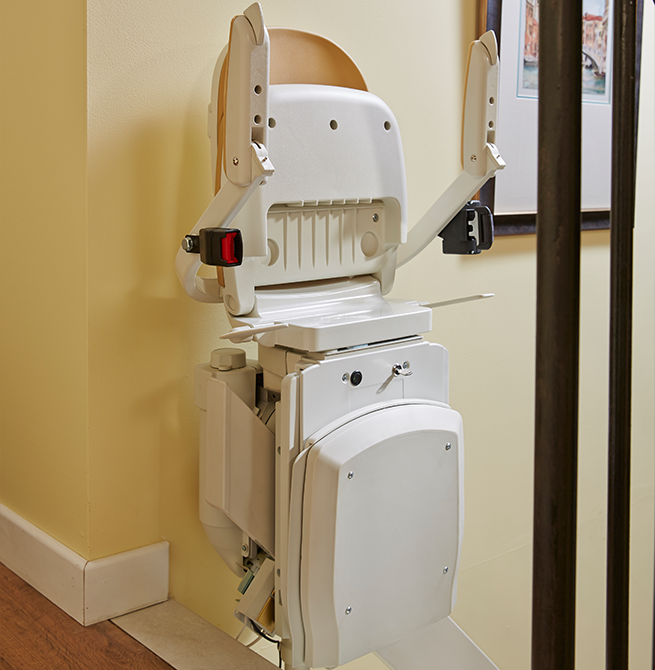 Aacorn Stairlifts folded at the top of stairs